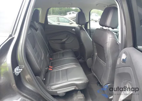 2017 Ford Escape Titanium z USA, uszkodzony, nr VIN 1FMCU0J97HUD24223